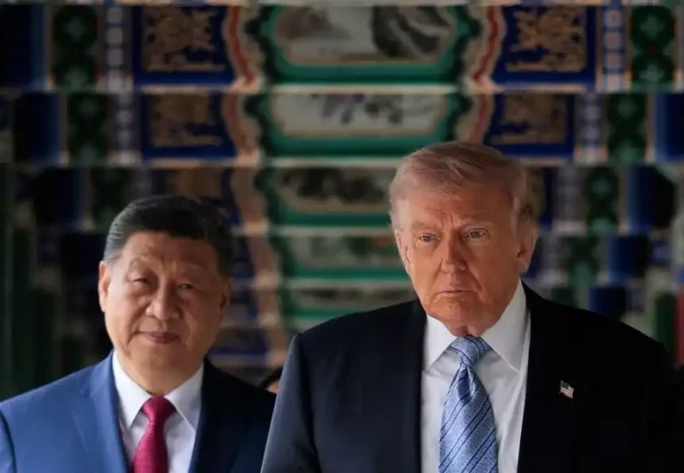US President Donald Trump walks through Zhongnanhai Garden with Chinese leader Xi Jinping in Beijing, China, on May 15. Evan Vucci/Reuters)
